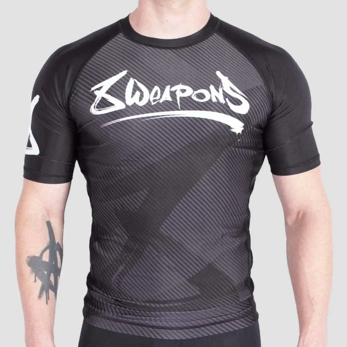 8 Weapons Strike Short Sleeve Rash Guard Black