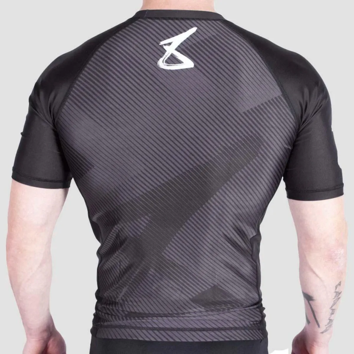 8 Weapons Strike Short Sleeve Rash Guard Black