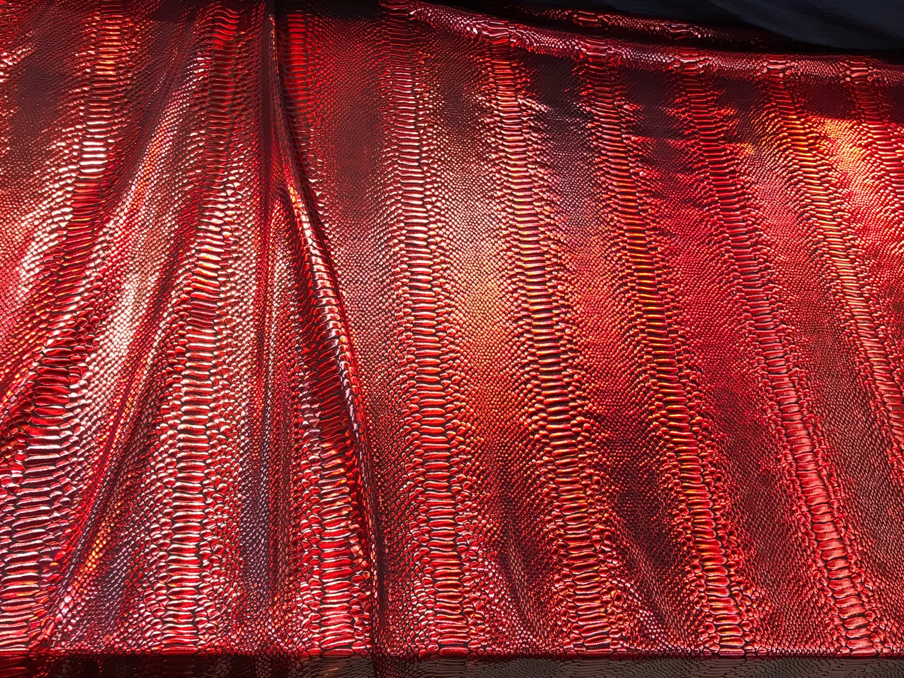 Red iridescent snake skin print on a 2 way stretch nylon spandex-skirts-leggings-dresses-decorations-nightgown-sold by the yard.