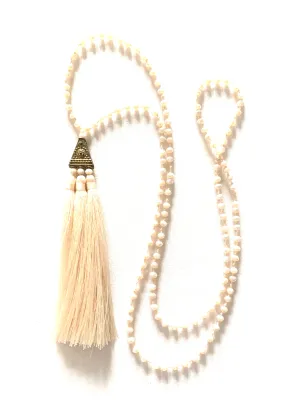 Sparkly nude beaded necklace with tassel