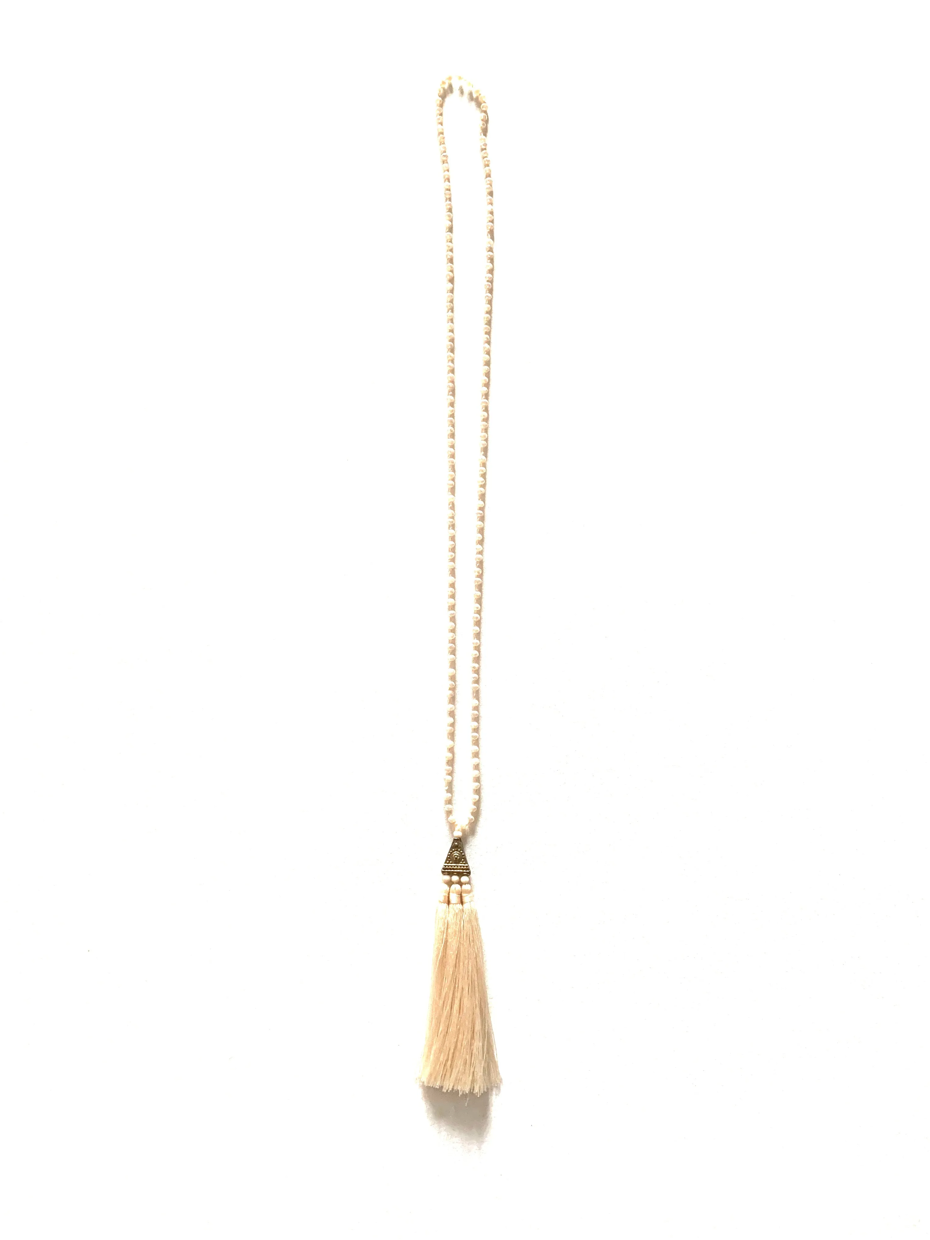Sparkly nude beaded necklace with tassel