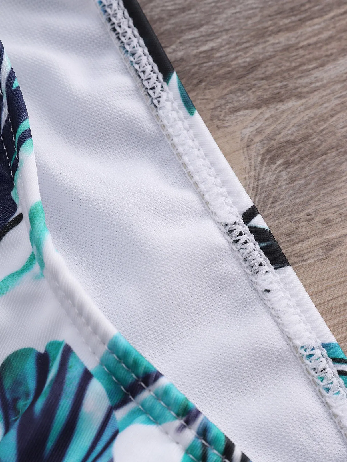 Wholesale Scoop Neck Sleeveless Printed Backless Irregular Hem Bikinis
