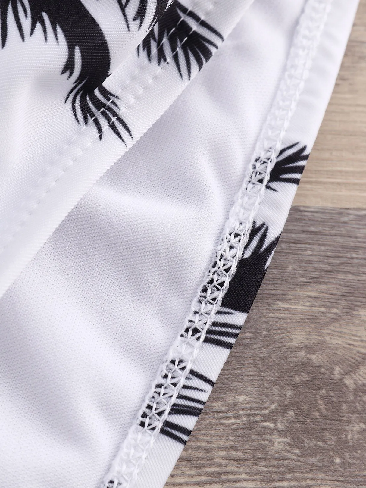Wholesale Scoop Neck Sleeveless Printed Backless Irregular Hem Bikinis